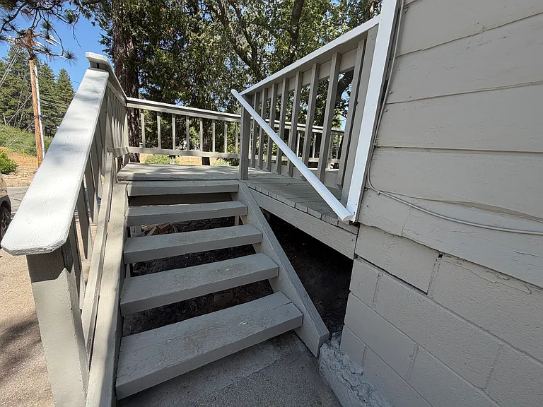 Entry stairs to front porch and home.