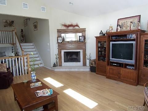 Separate Level Den w/fireplace