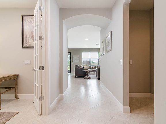Model Representation Foyer entrance with decorative archway into main living spaces