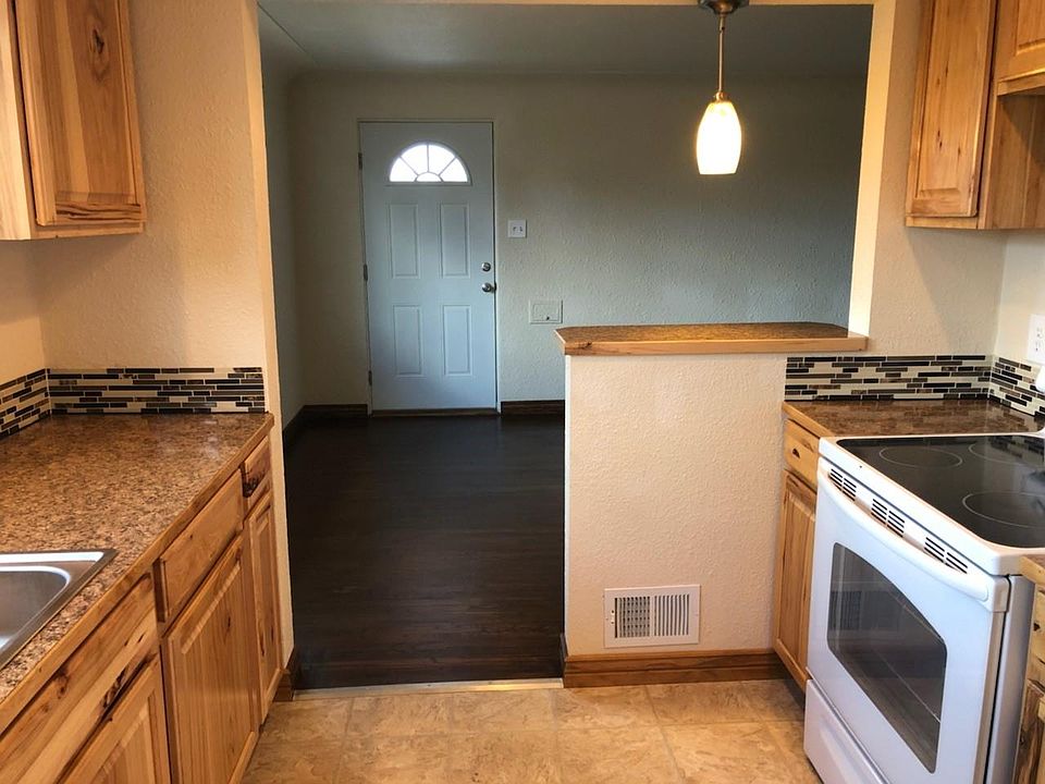 Kitchen looking into living room