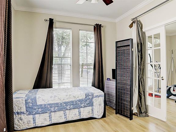 This is the second downstairs bedroom. It is full of light and would also make a great office.