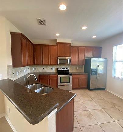 4th image of 7608 Sutherton Ln