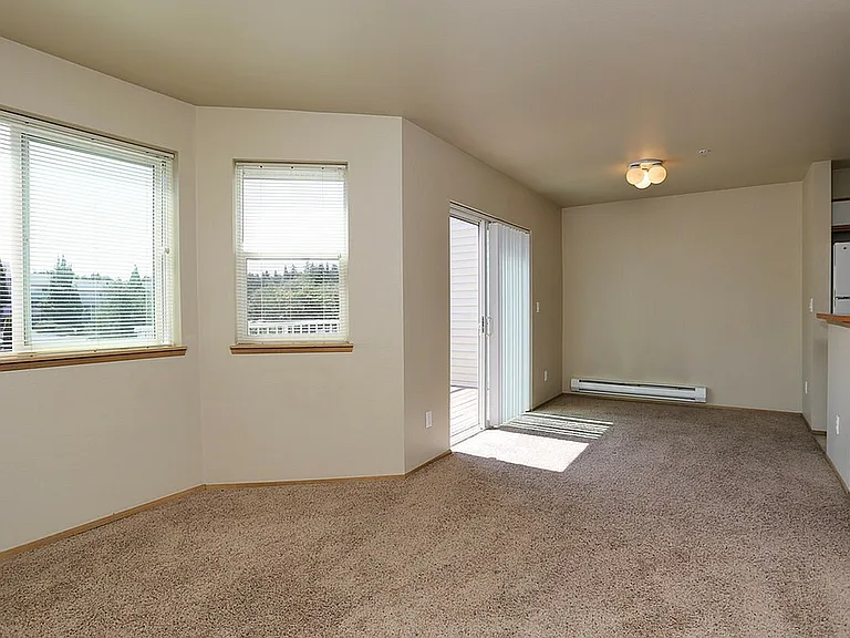 Living Room & Slider Out To Private Balcony