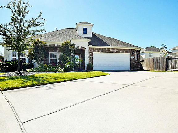 Beautiful home located on a cul-de-sac with a large driveway.