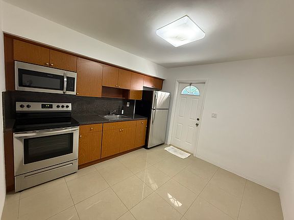 Kitchen with stainless steel appliances