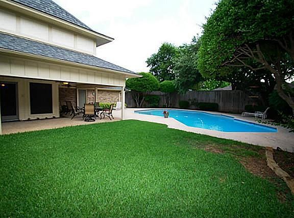 Big backyard and a pool
