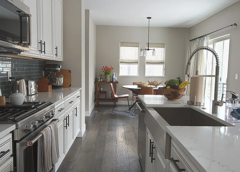 Looking on from the Kitchen to Dining Area which is near entryway from the stairway from the first floor.