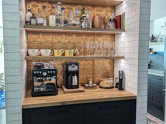 Coffee Bar with LED lighting and extra storage.