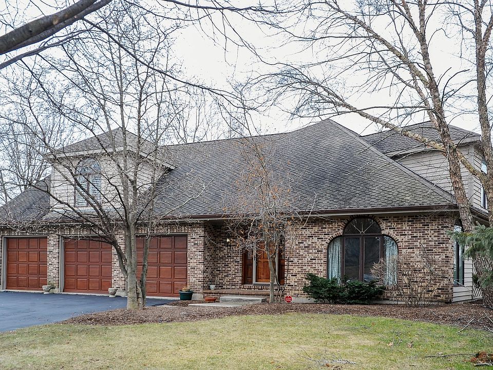 Stunning waterfront with 3+ car garage