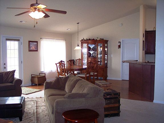 Open floor plan with dining room open to family room and kitchen.