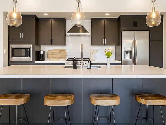 Kitchen with an oversized quartz island