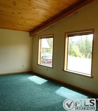 LARGE WINDOWS BRING OUTDOORS IN