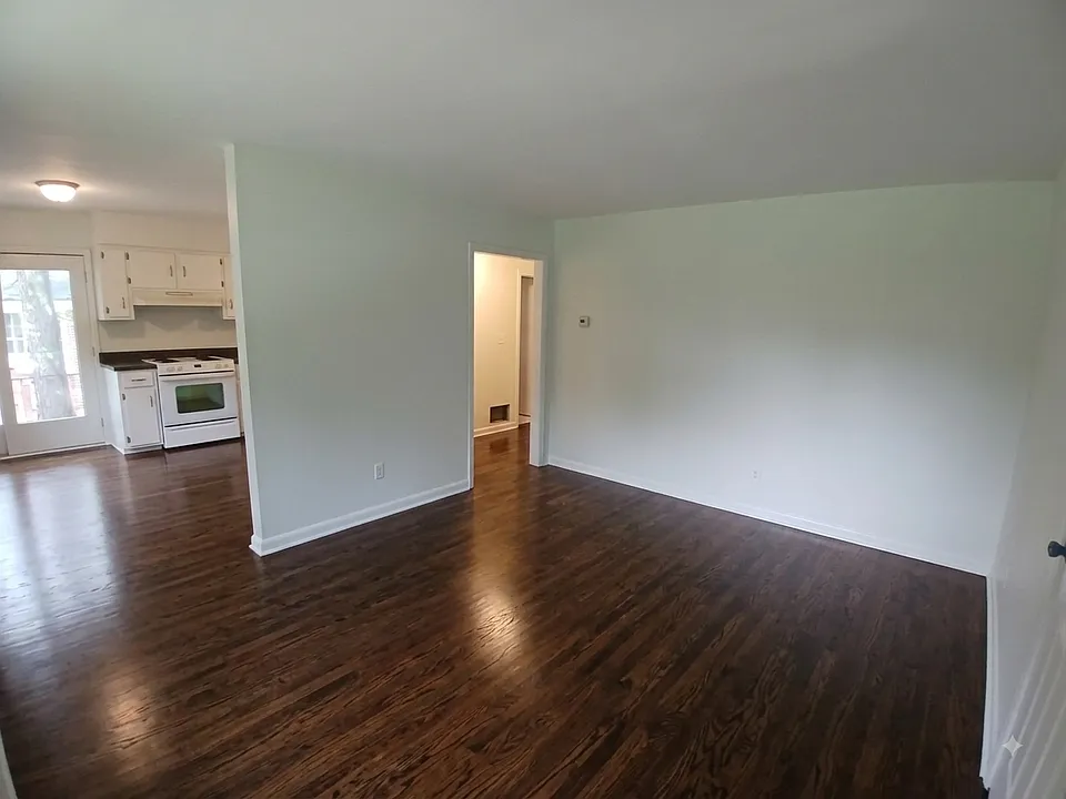 Living Room Leading to Kitchen and Hallway