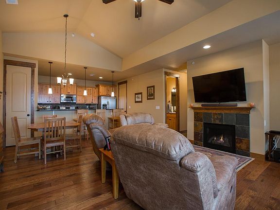 Hardwood floors in the living/dining kitchen area. Fireplac