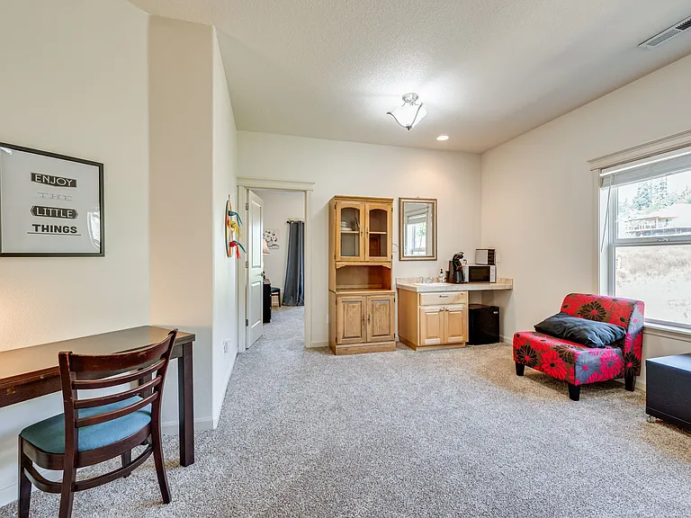 Features a kitchenette, an extra seating area and twin bed with trundle