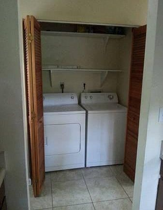 Inside washer and dryer.