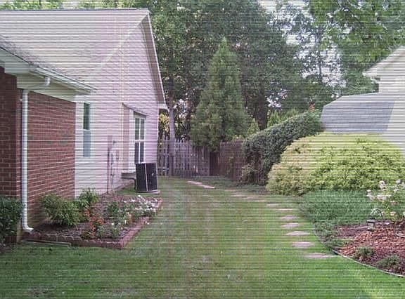 Front/side yard with mature landscaping