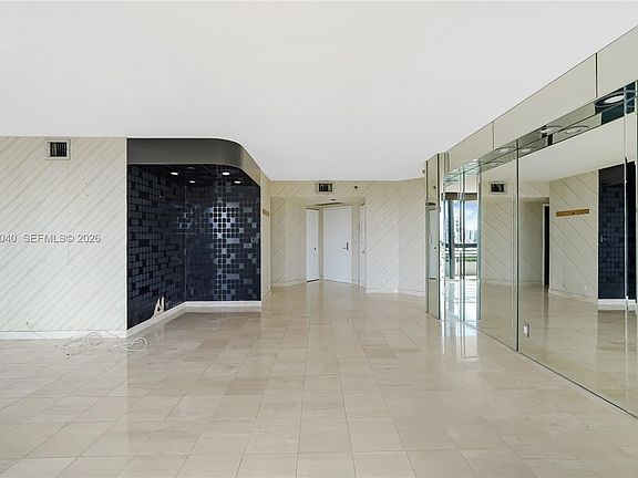 3rd image of 3600 Mystic Pointe Dr APT 812