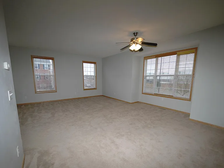 Oversized family room with a lot of natural light in this end unit townhouse