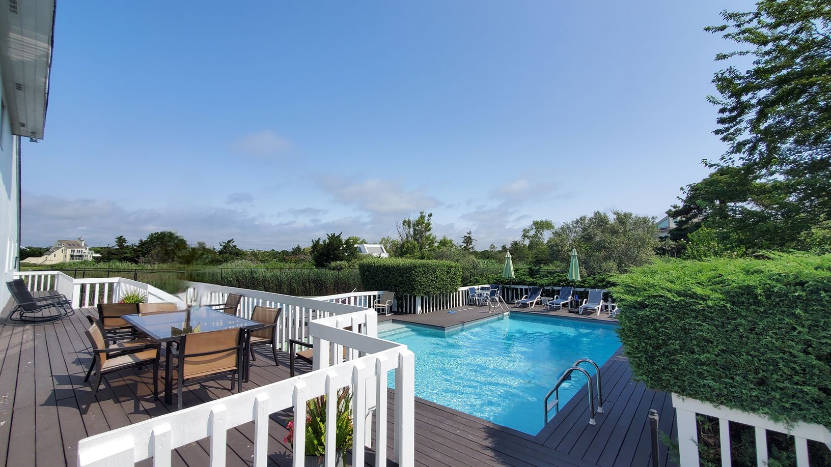  Heated L shaped pool with adjacent hot tub