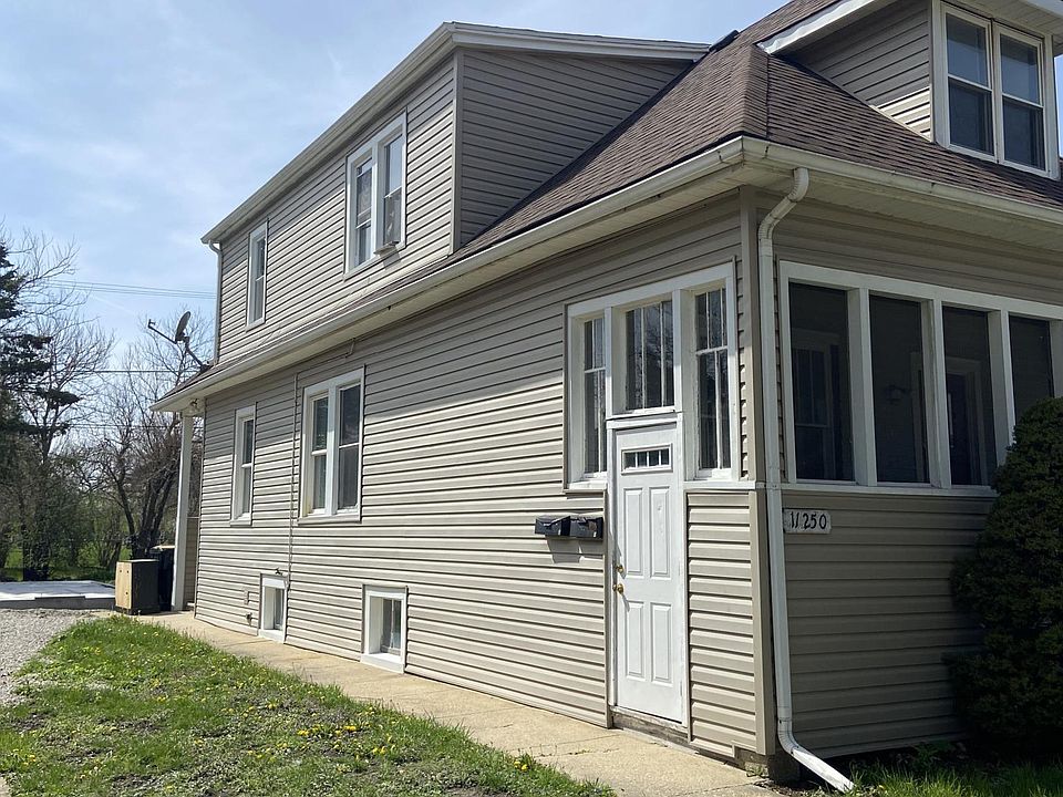 Front/side of the house - separate mail boxes for both units.