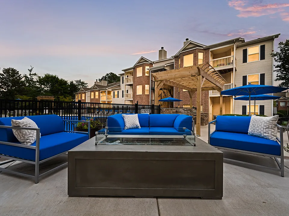 Poolside fire pit and outdoor kitchen