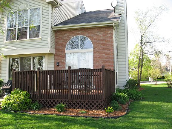 back of home with deck