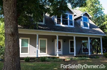 Front of House
						:
						Close-up of the front of the house from the front yard. House faces north.