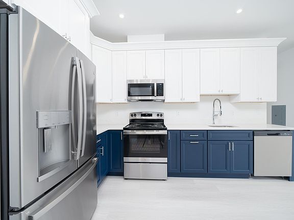 STAINLESS KITCHEN WITH LOTS OF STORAGE