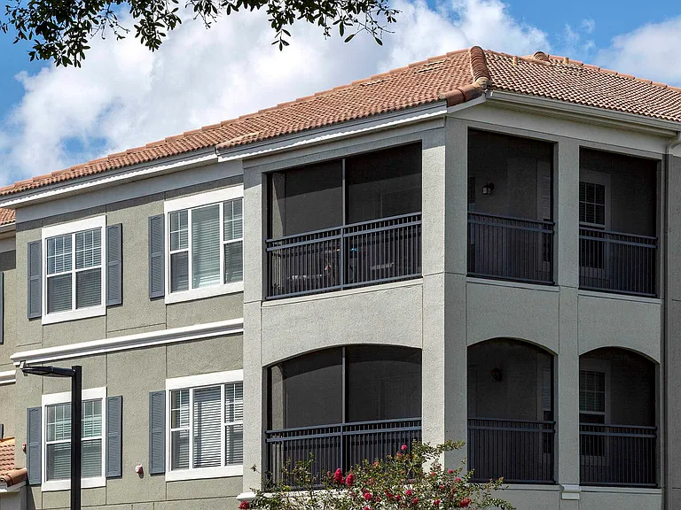 Building exterior with screened balconies