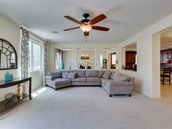 Family room with dining room in back and kitchen to right