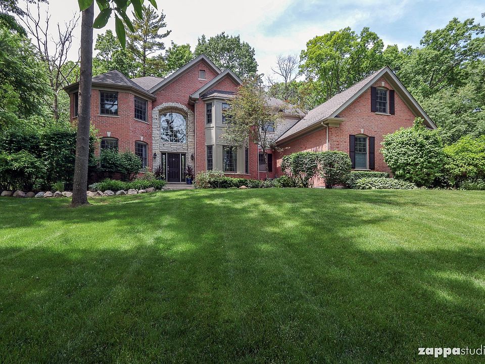 Welcome to 709 Fox Trail, an EXCEPTIONAL value with over 6500 square feet of finished living space, 