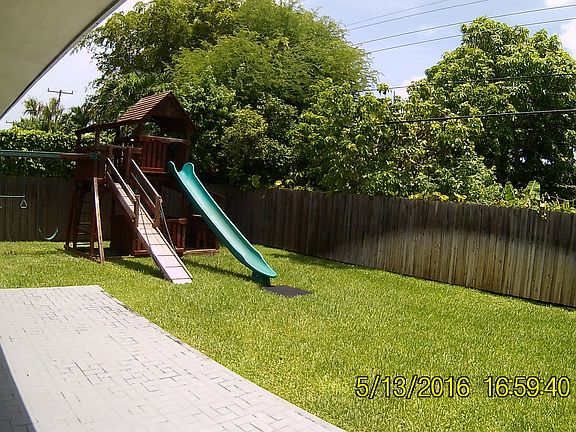 Large, fully fenced backyard