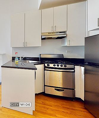 3rd image of 33 E 65th St #1B