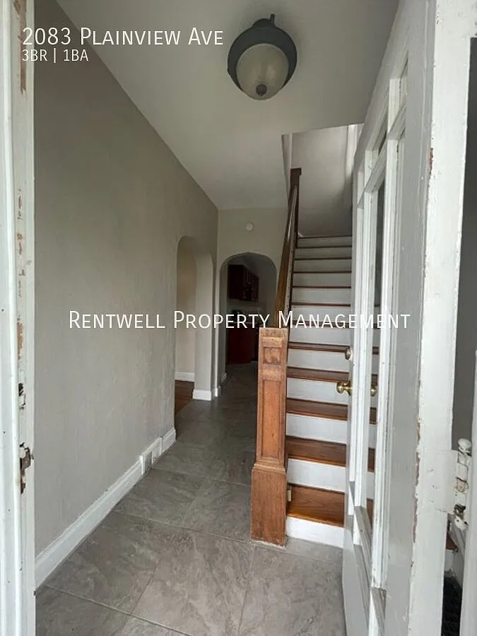Beautifully Updated 3-Bedroom Home with Exposed Brick Fireplace — Photo 2