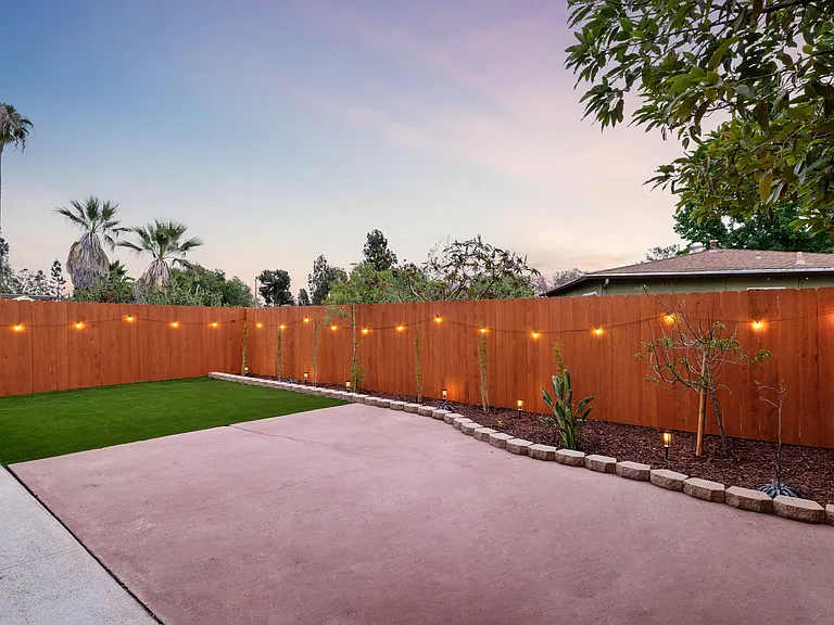 As dusk falls, watch the space transform as solar-powered string and accent lights brighten the yard.