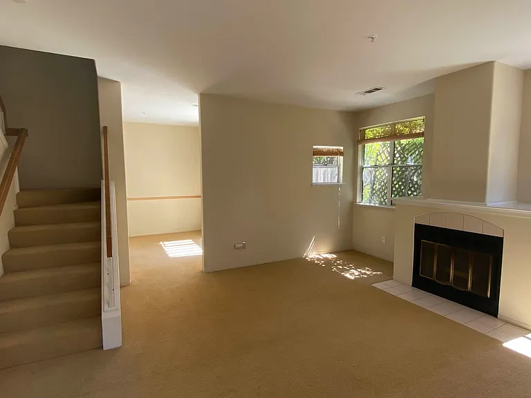 Natural fireplace in the living room with bonus office or TV room.