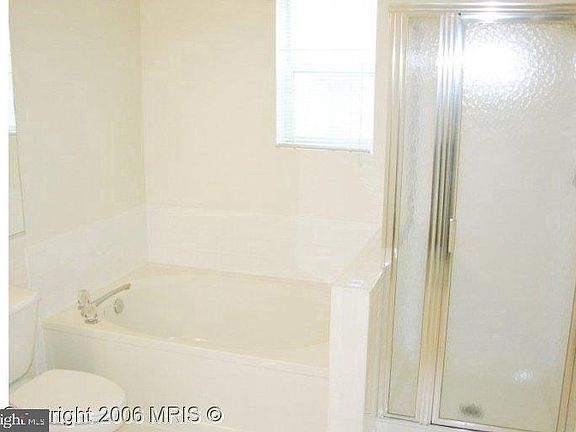 4th image of 7000 Falls Reach Dr APT 211