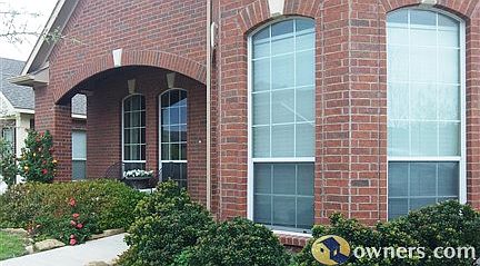 Front of the home features a welcoming front porch.
