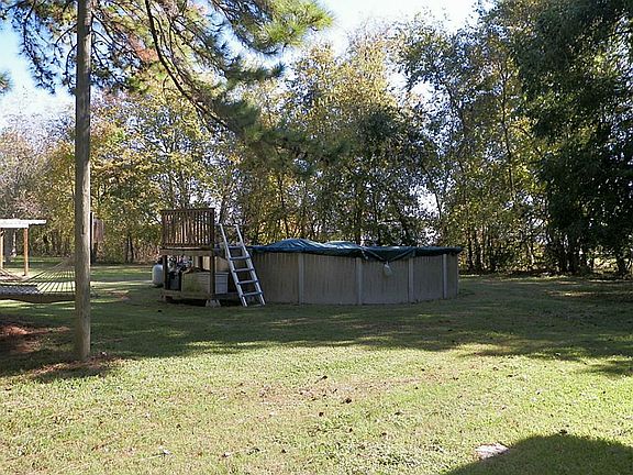 Where will the kids be on a hot summer day? This pool is huge!