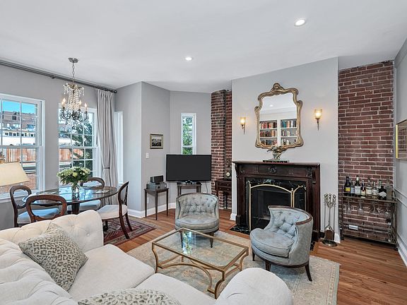 Living room with view of fireplace