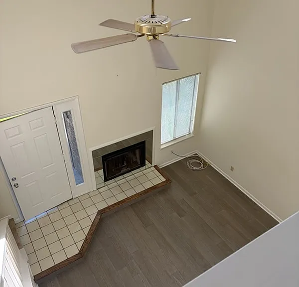 view from upstairs looking down into living room.