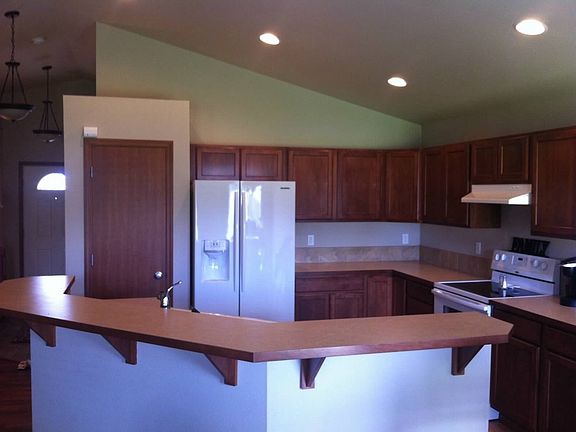Open Kitchen with Vaulted Ceilings