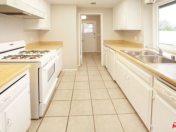 4th image of 5035 N Louise St