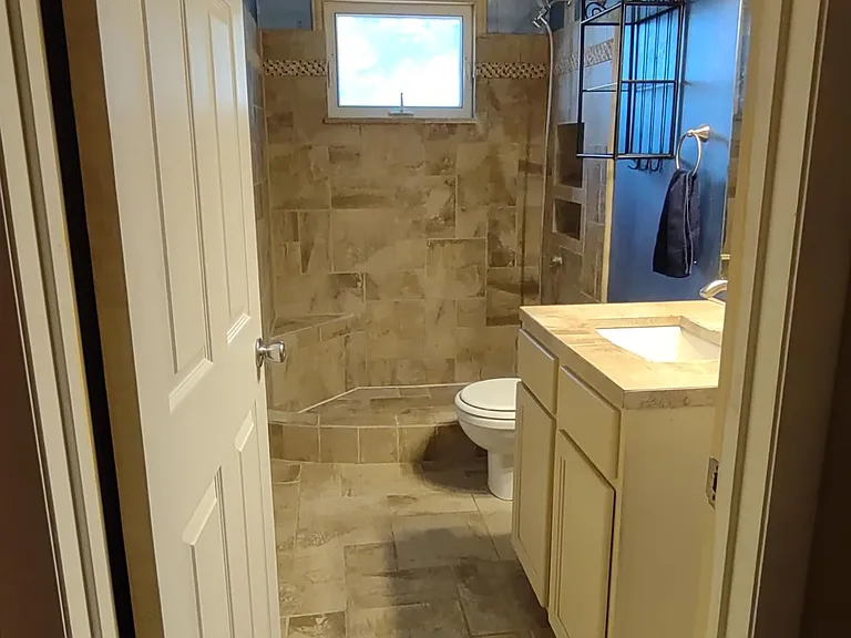 bathroom, has walk-in shower, undersink, new toilette, towel closet.