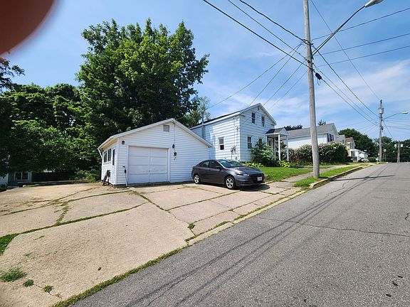 Garage for storage and off street parking for 4+ comes in handy when city bans on-street parking mid-winter for plowing.