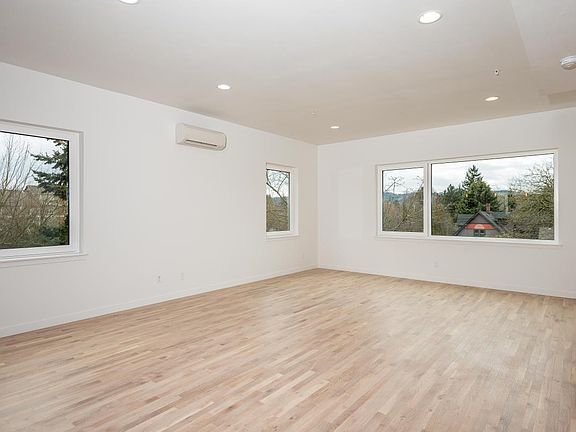 3rd floor Dining & Living Room with abundant natural light a