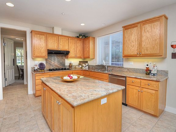 Chef\&#039;s Kitchen with Center Island, Slab Granite Counters, Updated Appliances