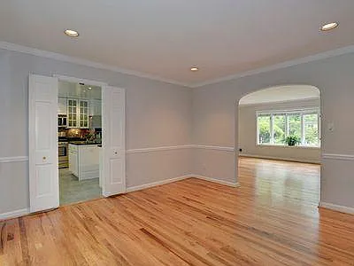 Dining Room - Door to Kitchen (left) and Opening to Family Room (right)
