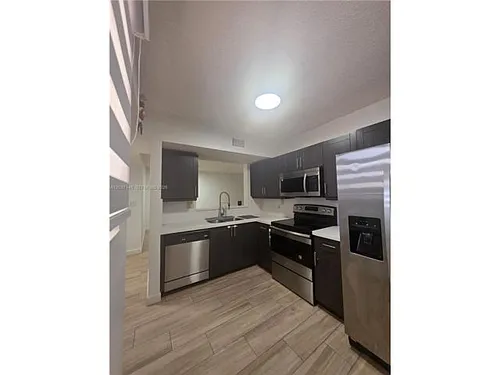 15711 SW 137th Ave #101 Photo 1